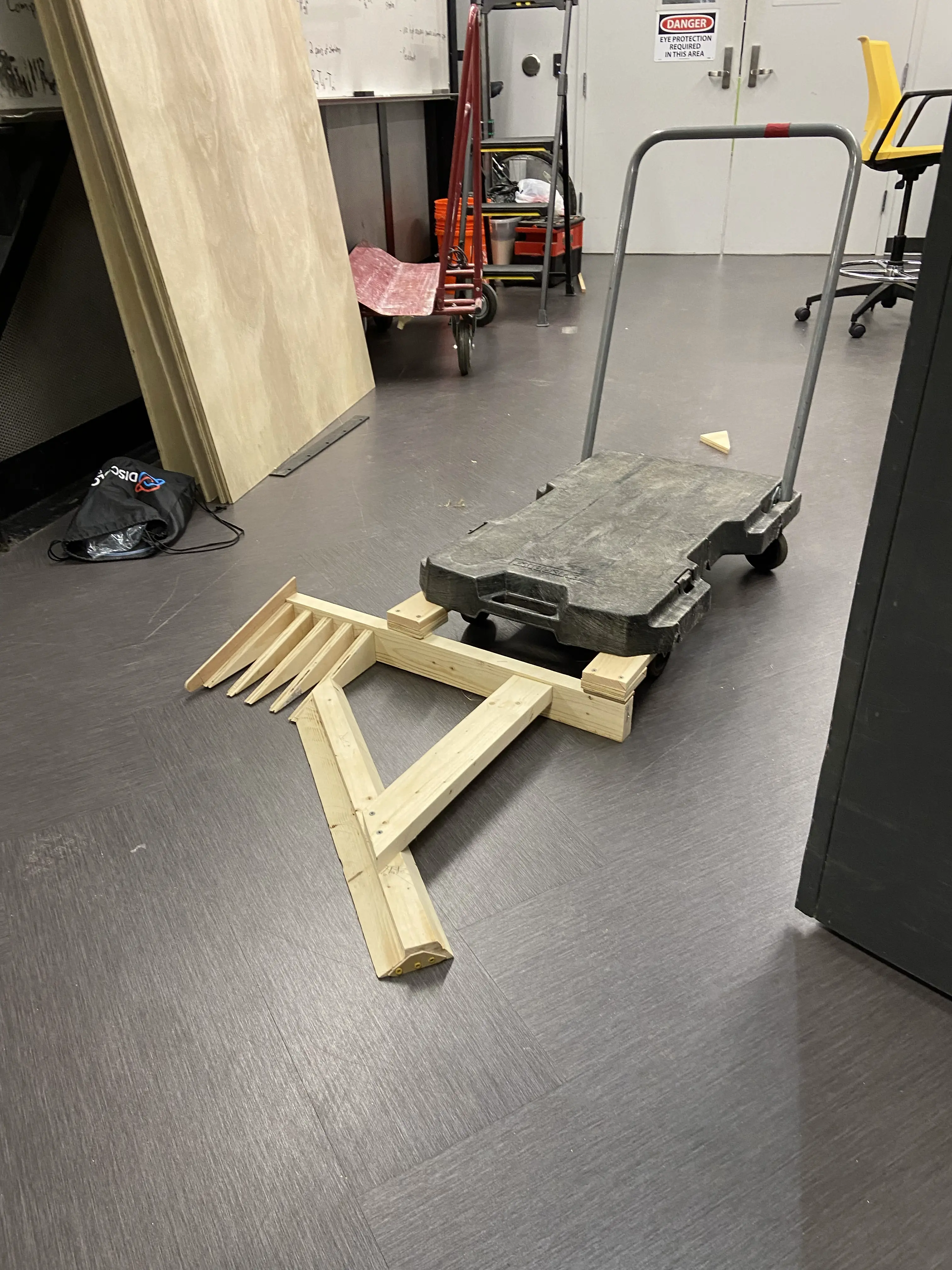 An awful wooden rake prototype